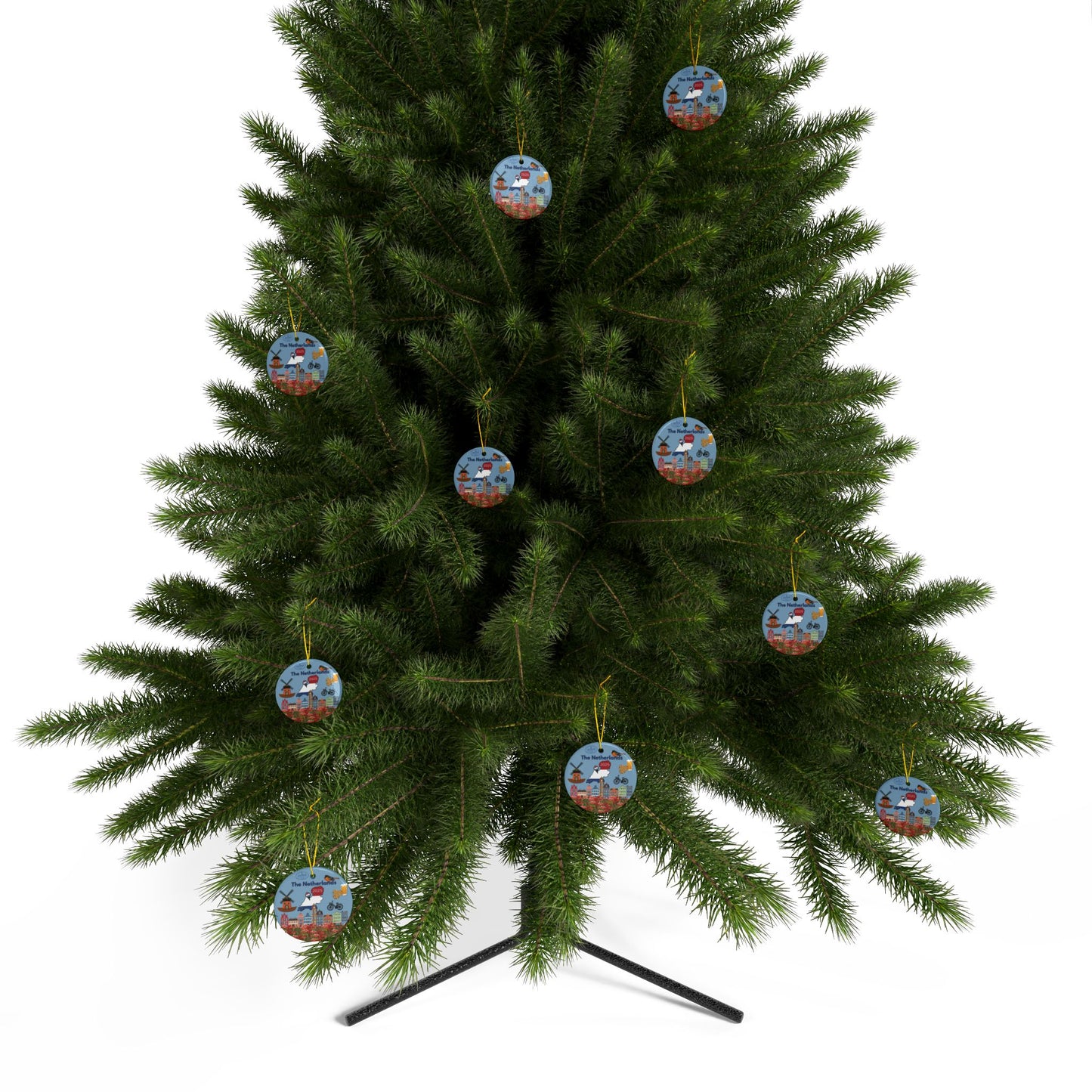 Green Christmas tree with decorative ornaments on a white background