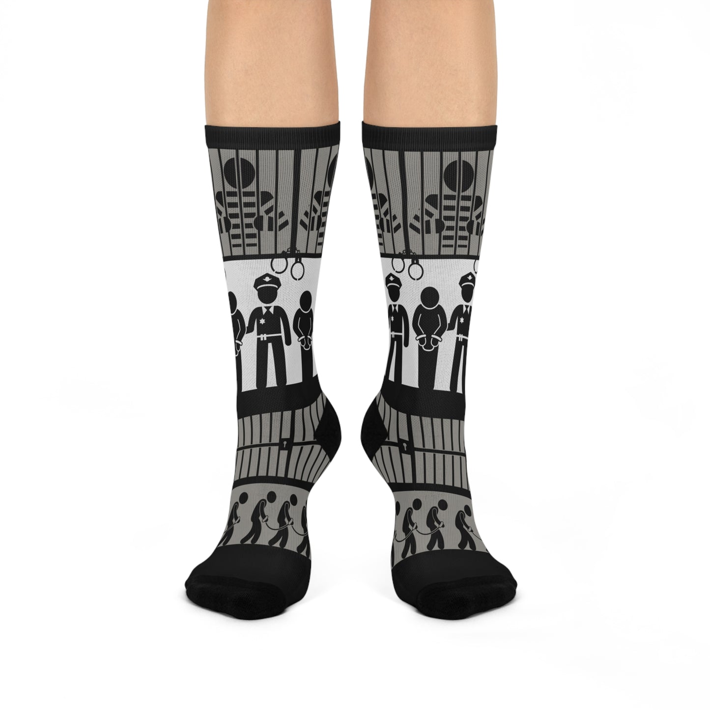 A pair of crew socks with a mid-calf height featuring a black and white pattern with law enforcement and legal-themed graphics.
