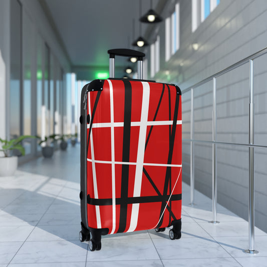 Red suitcase black white random stripes in airport