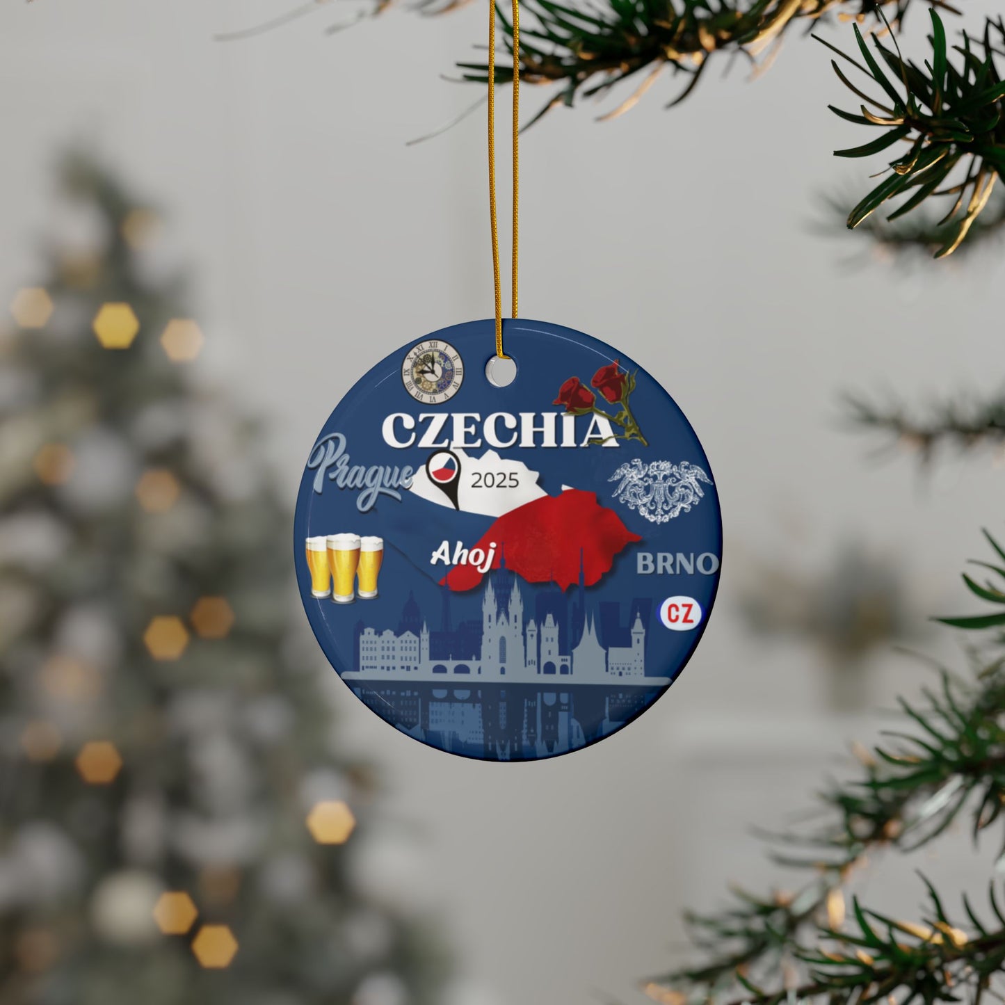 Decorative Christmas ornament with Czechia-themed design hanging on a tree.