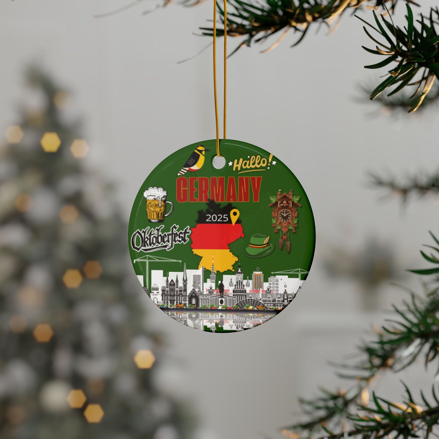 Circular ornament with German-themed design hanging from a tree.