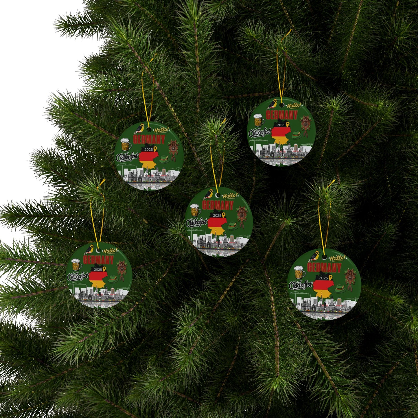 Circular Christmas ornaments with cityscape designs hanging on a tree.