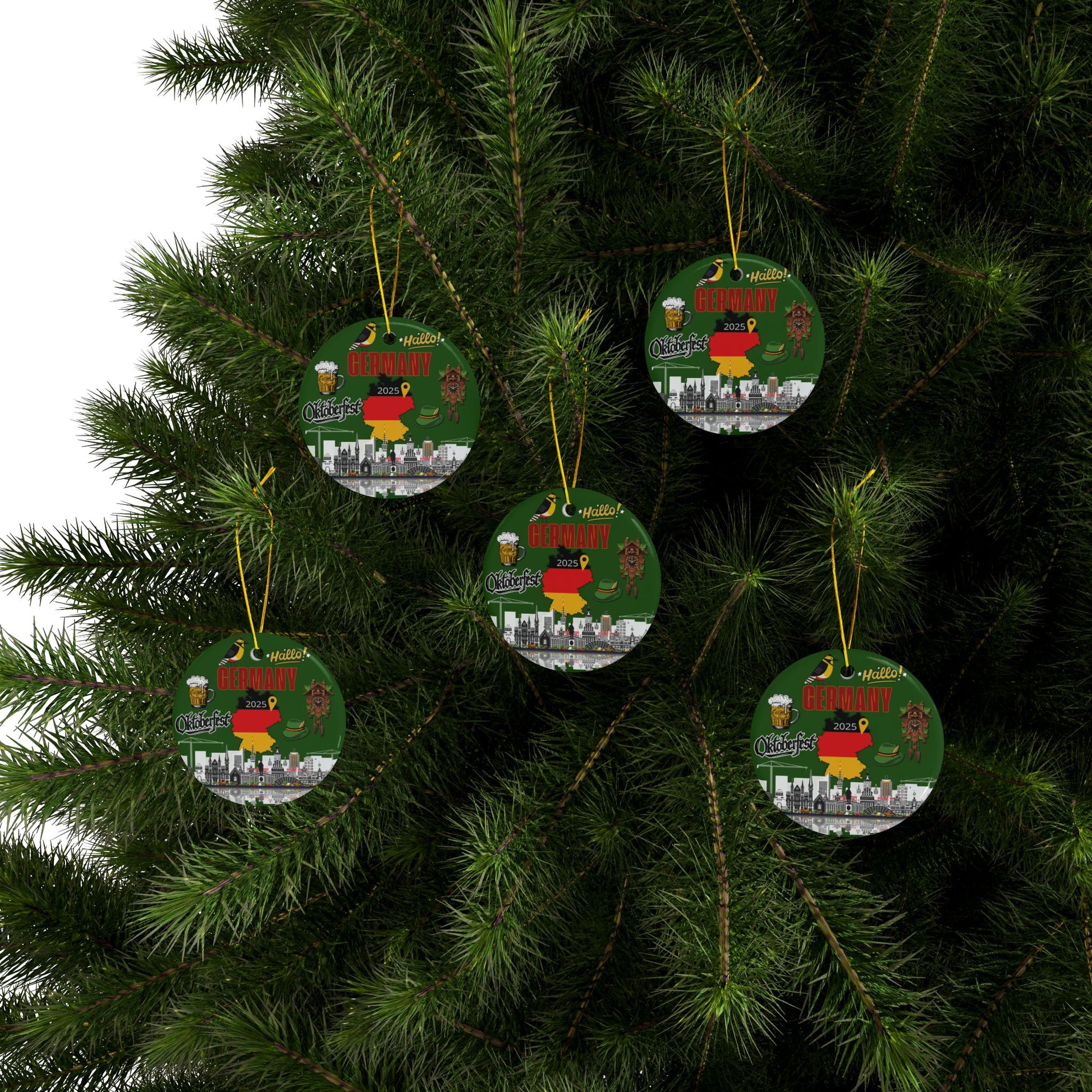 Circular Christmas ornaments with cityscape designs hanging on a tree.