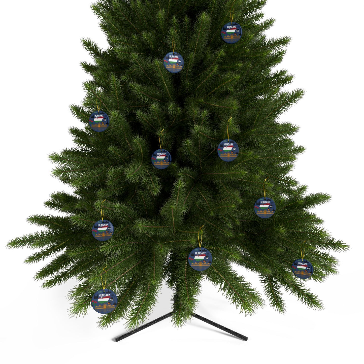 Green Christmas tree with blue and gold ornaments on a white background