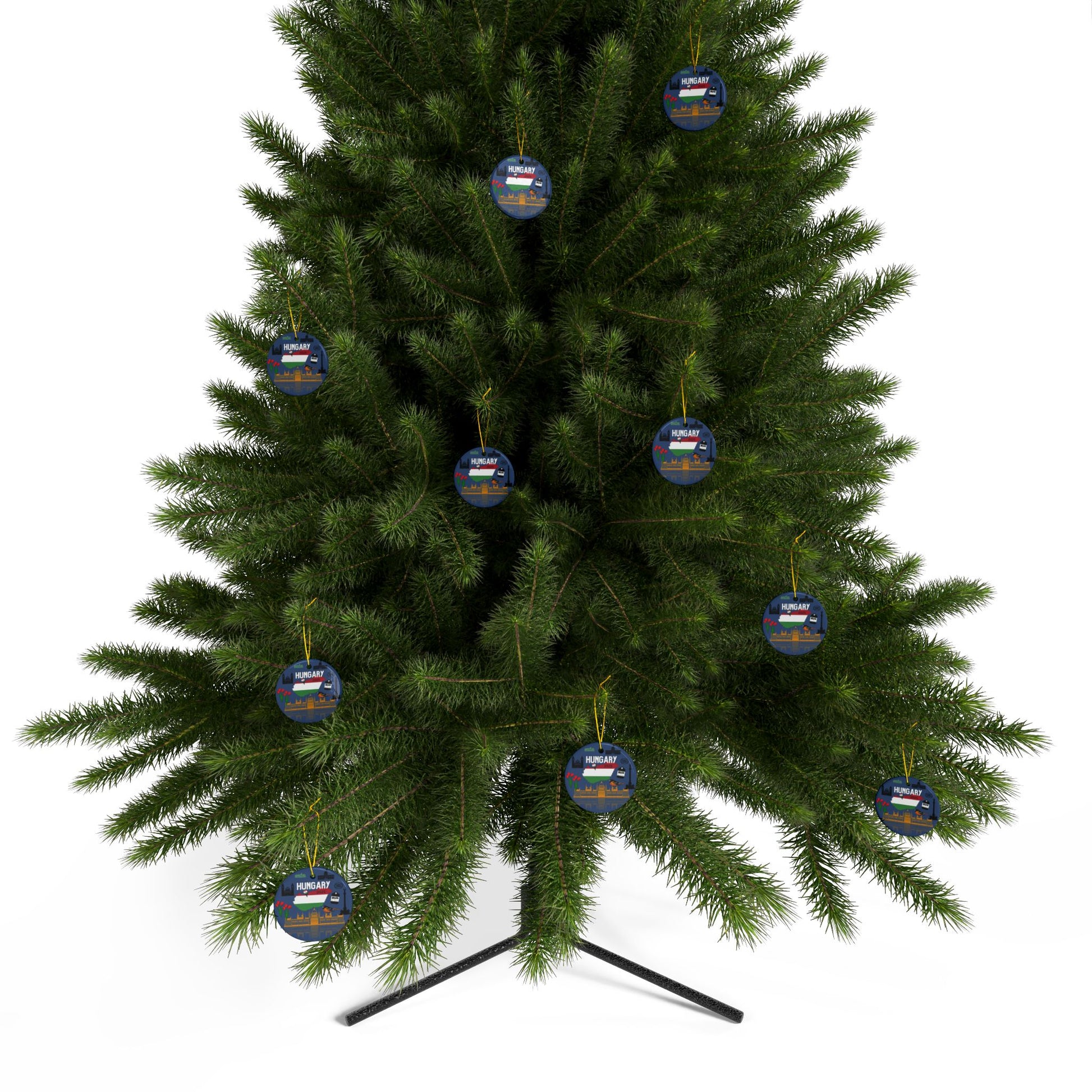 Green Christmas tree with blue and gold ornaments on a white background