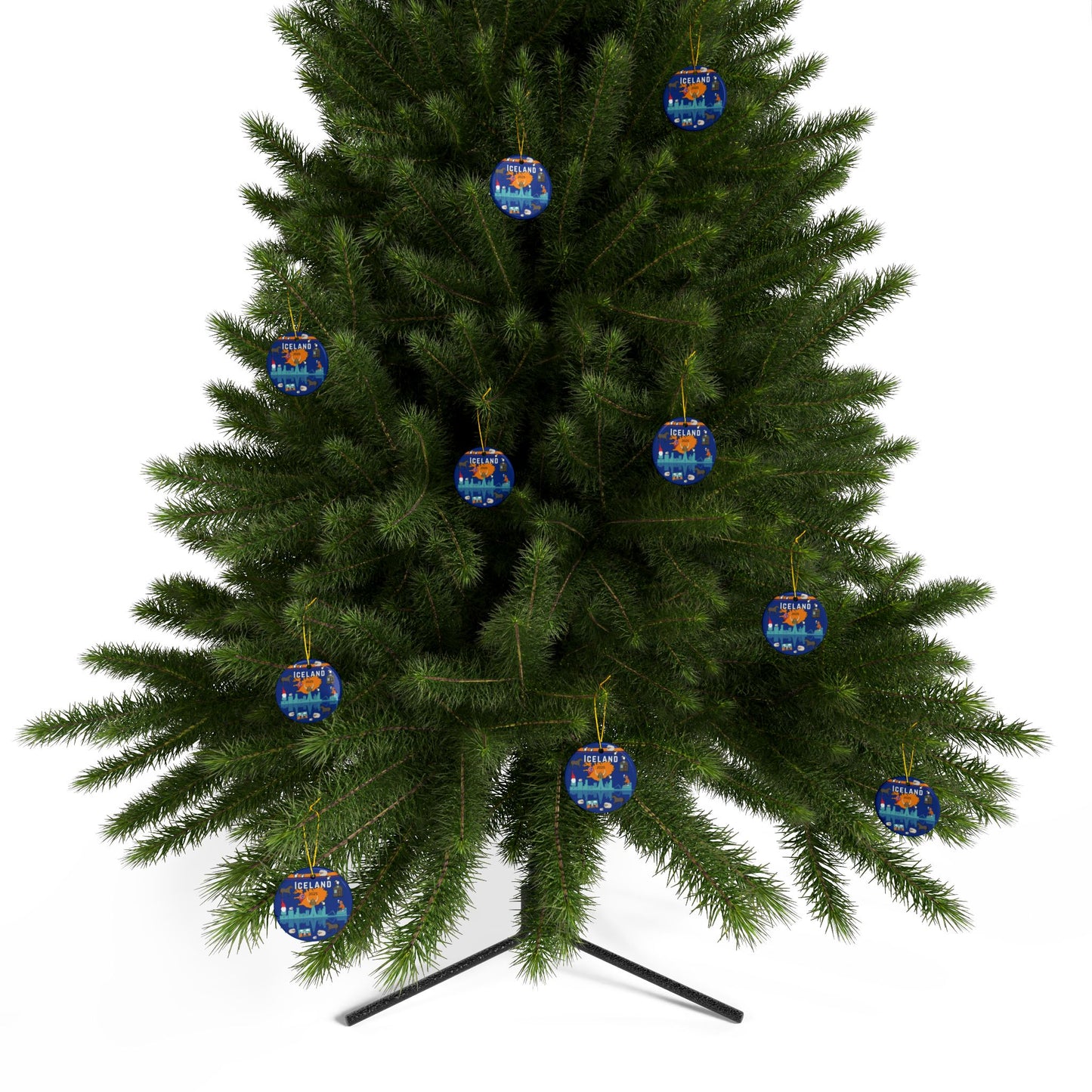 Green Christmas tree with blue and gold ornaments on a white background