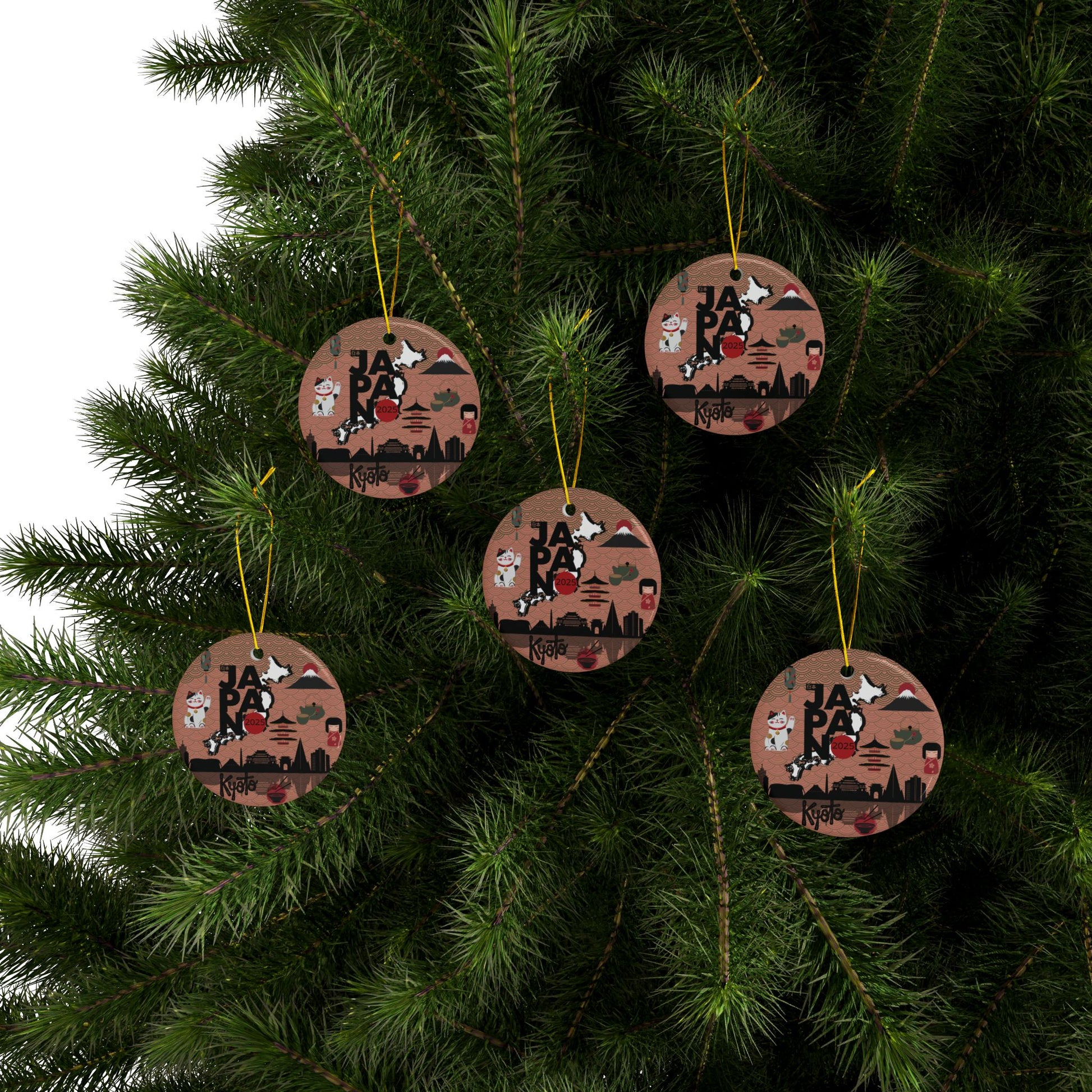 Decorative Christmas ornaments with Japanese-themed designs hanging on a tree.
