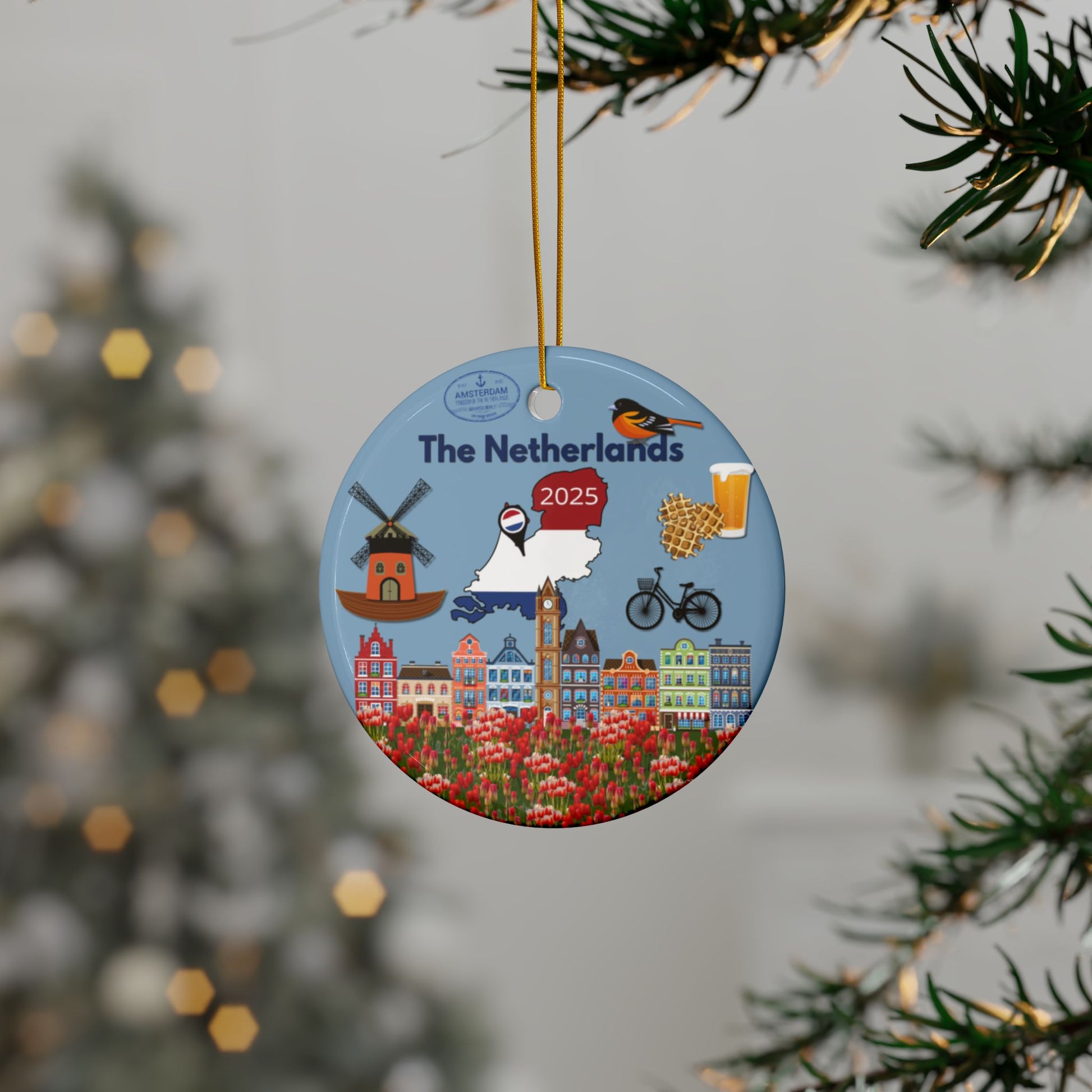 Decorative ornament with Netherlands-themed illustrations hanging on a tree.