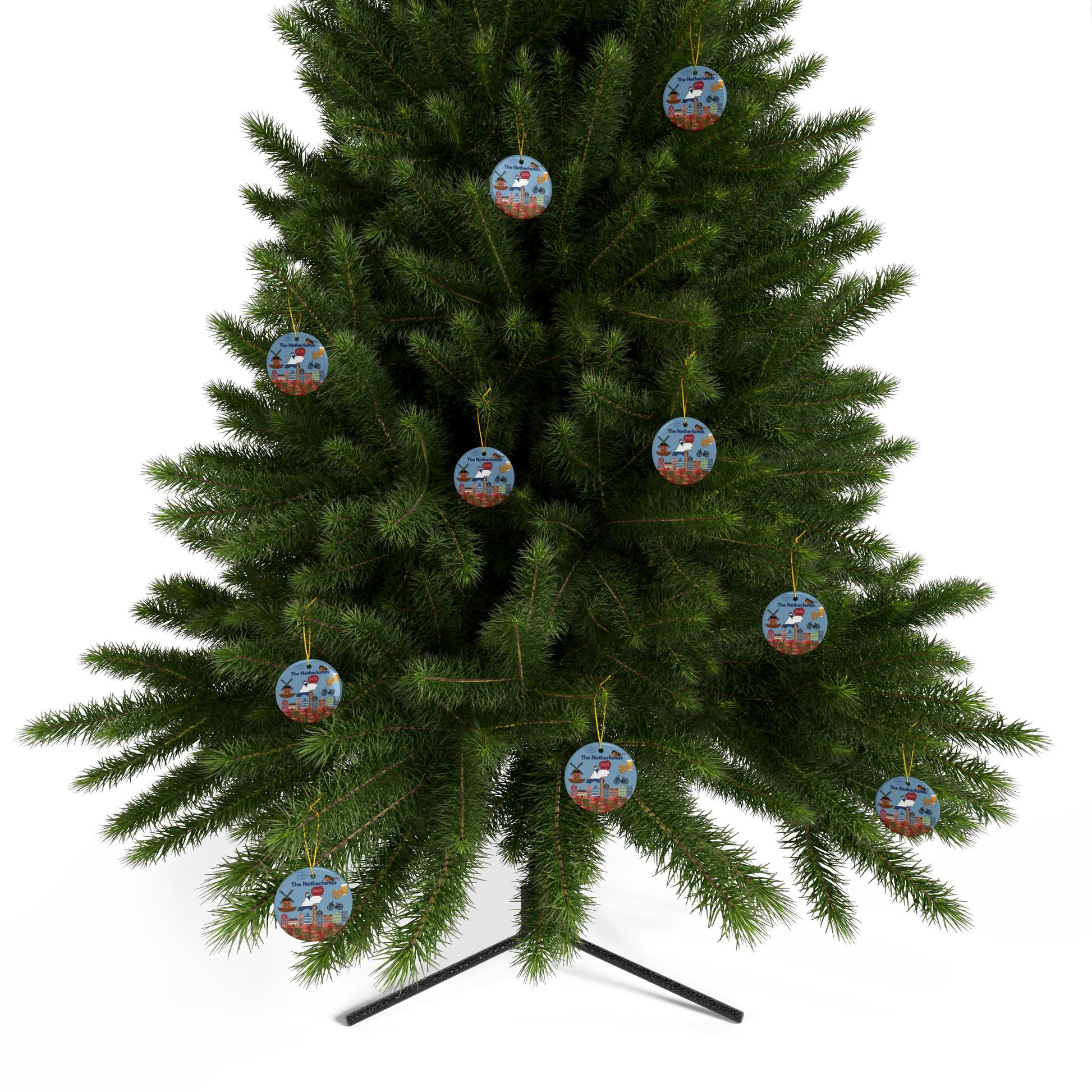 Green Christmas tree with decorative ornaments on a white background
