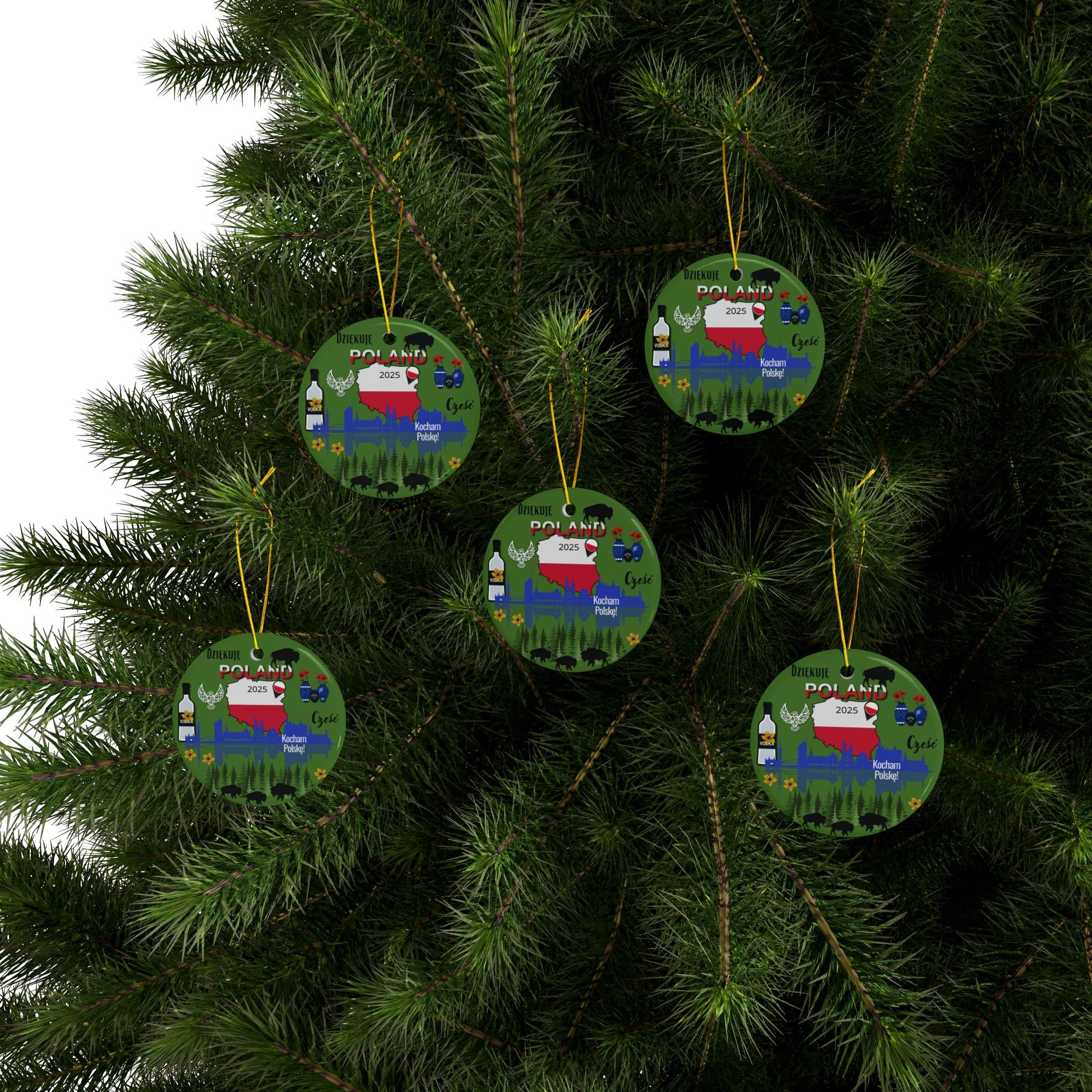 Decorative Christmas ornaments with train designs on a tree