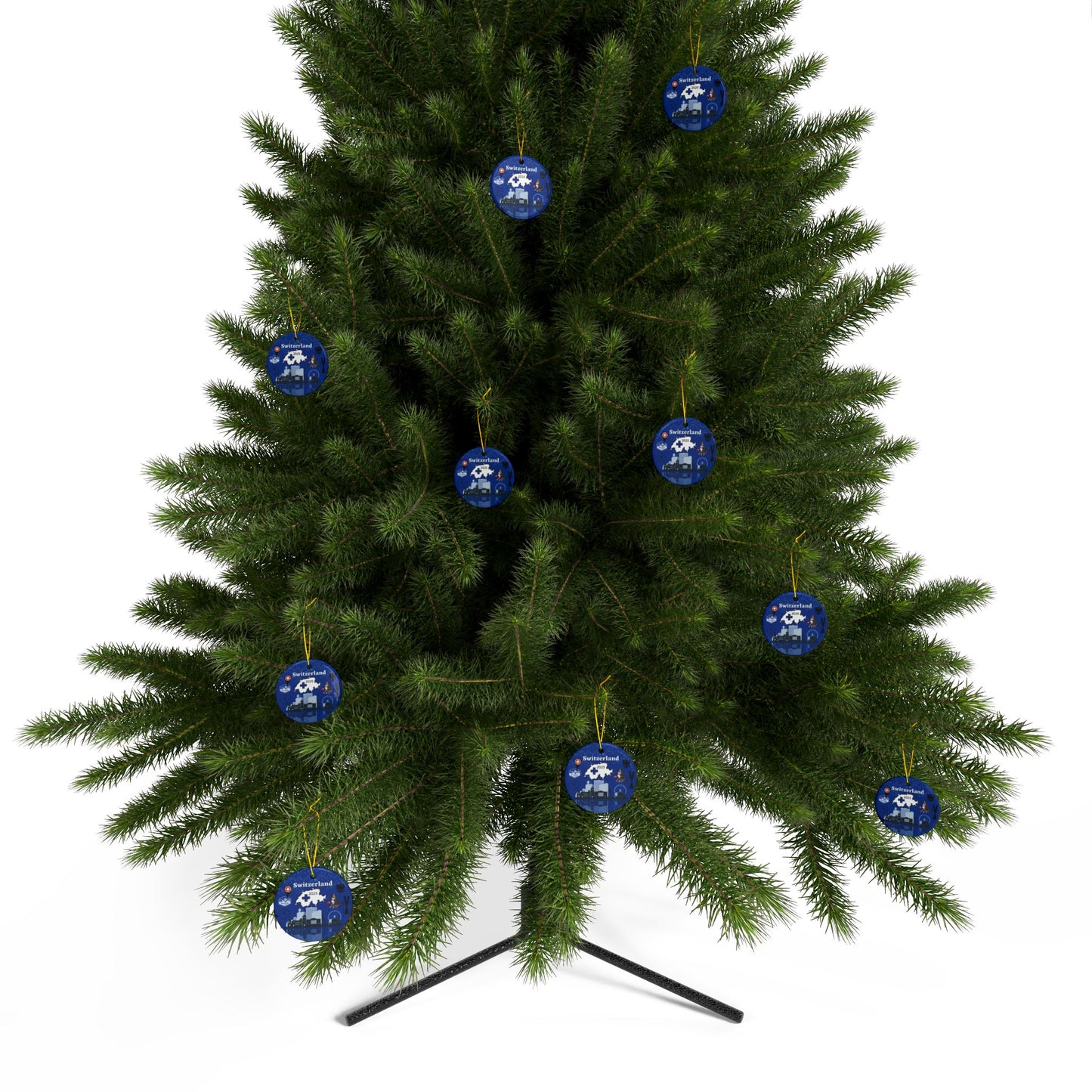 Green Christmas tree with blue ornaments on a white background